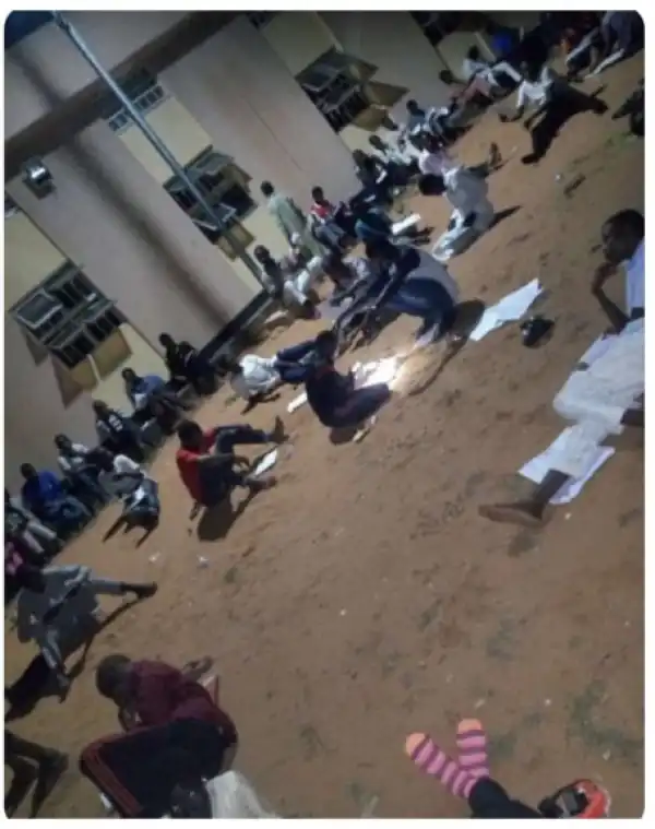 Photo Of Usman Danfodio University Students Reading Under The Moonlight